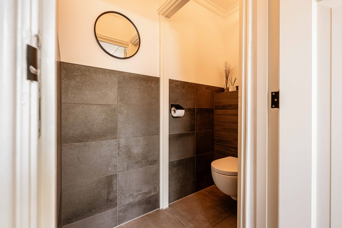 Tussenwoning te koop: Merwedestraat 18, Haarlem