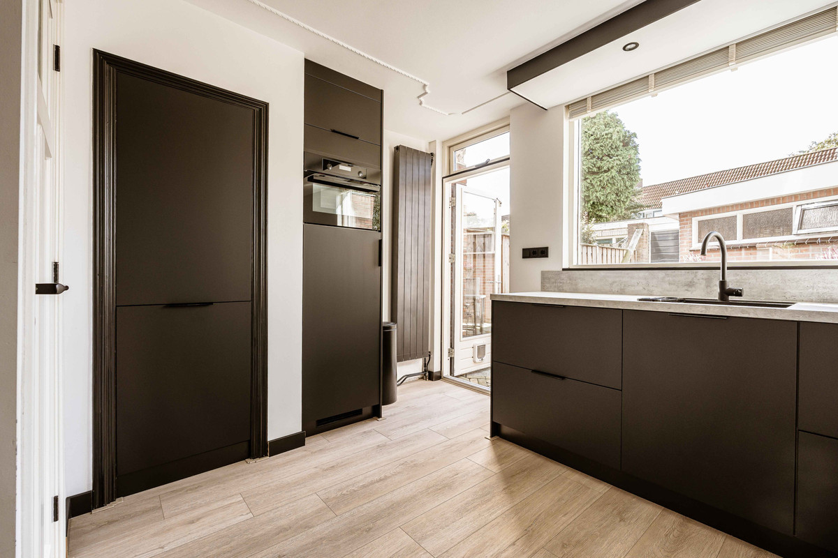 Tussenwoning te koop: Merwedestraat 18, Haarlem