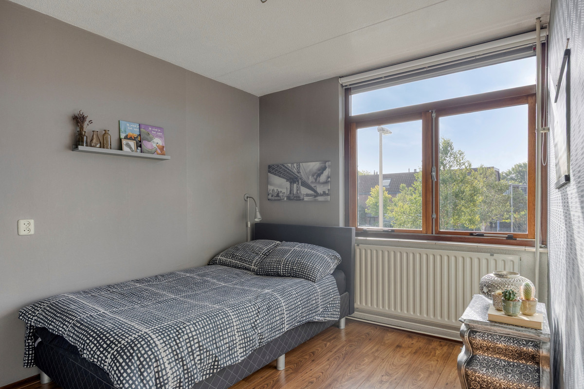 Tussenwoning te koop: Muzenlaan 51, Leiderdorp