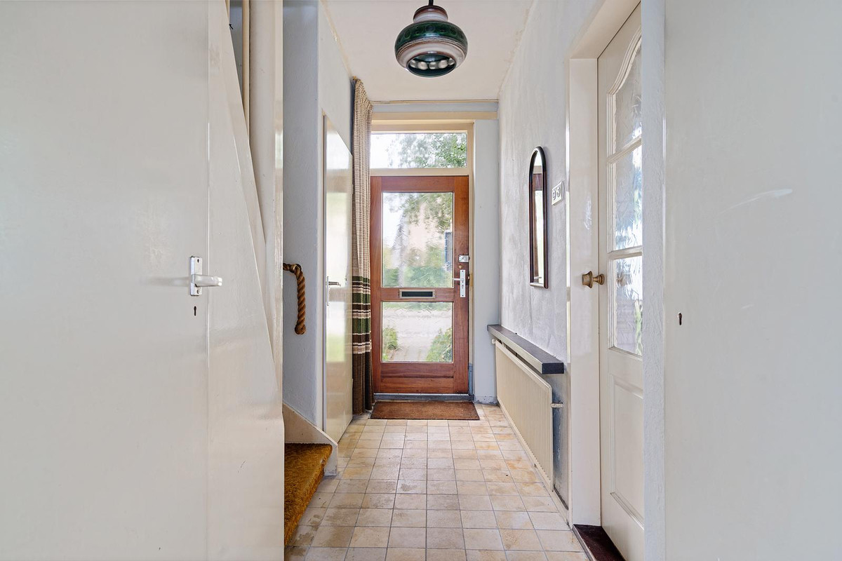 Tussenwoning te koop: Huygenslaan 15, Woudenberg