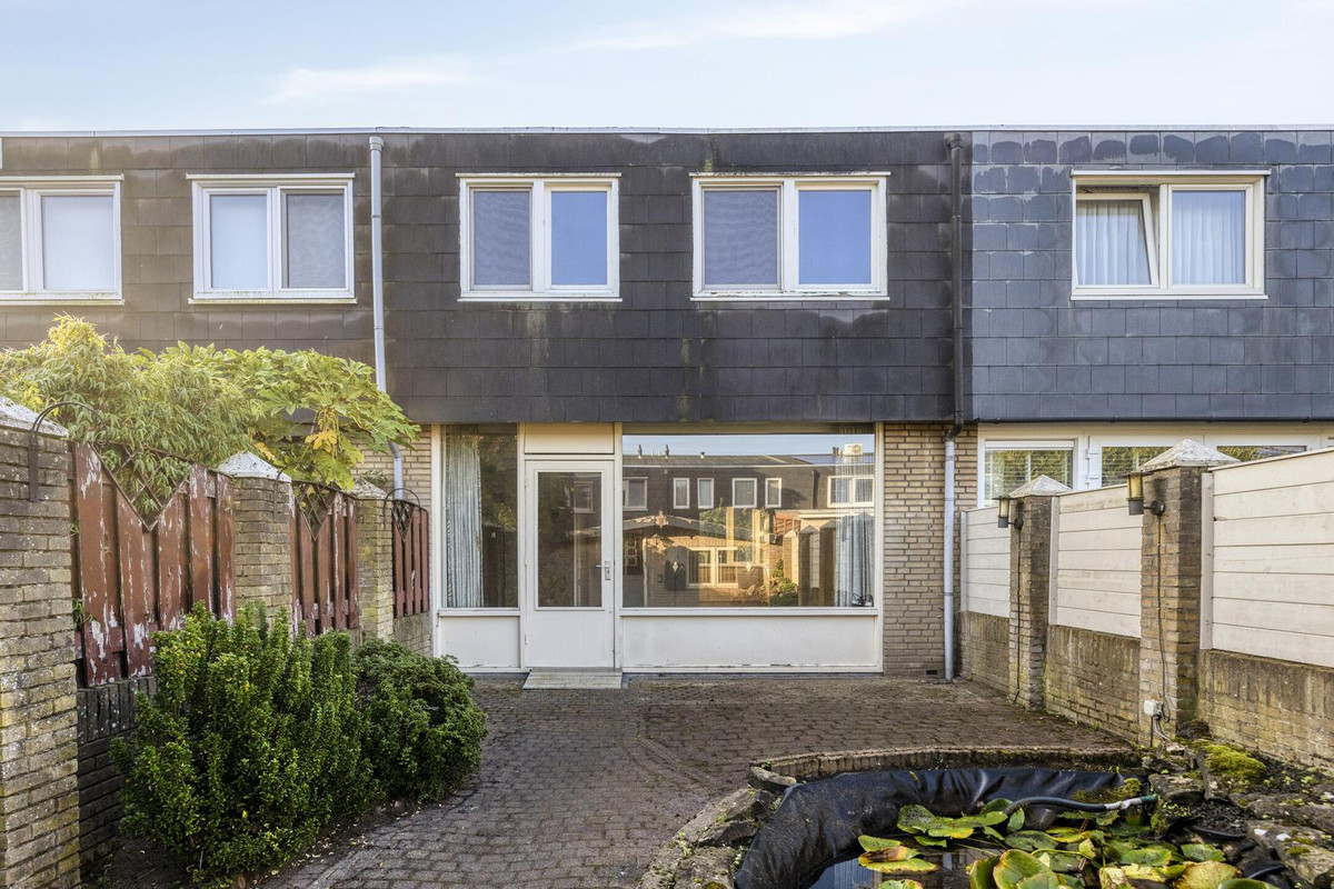 Tussenwoning te koop: Huijgensstraat 133, Hoogerheide