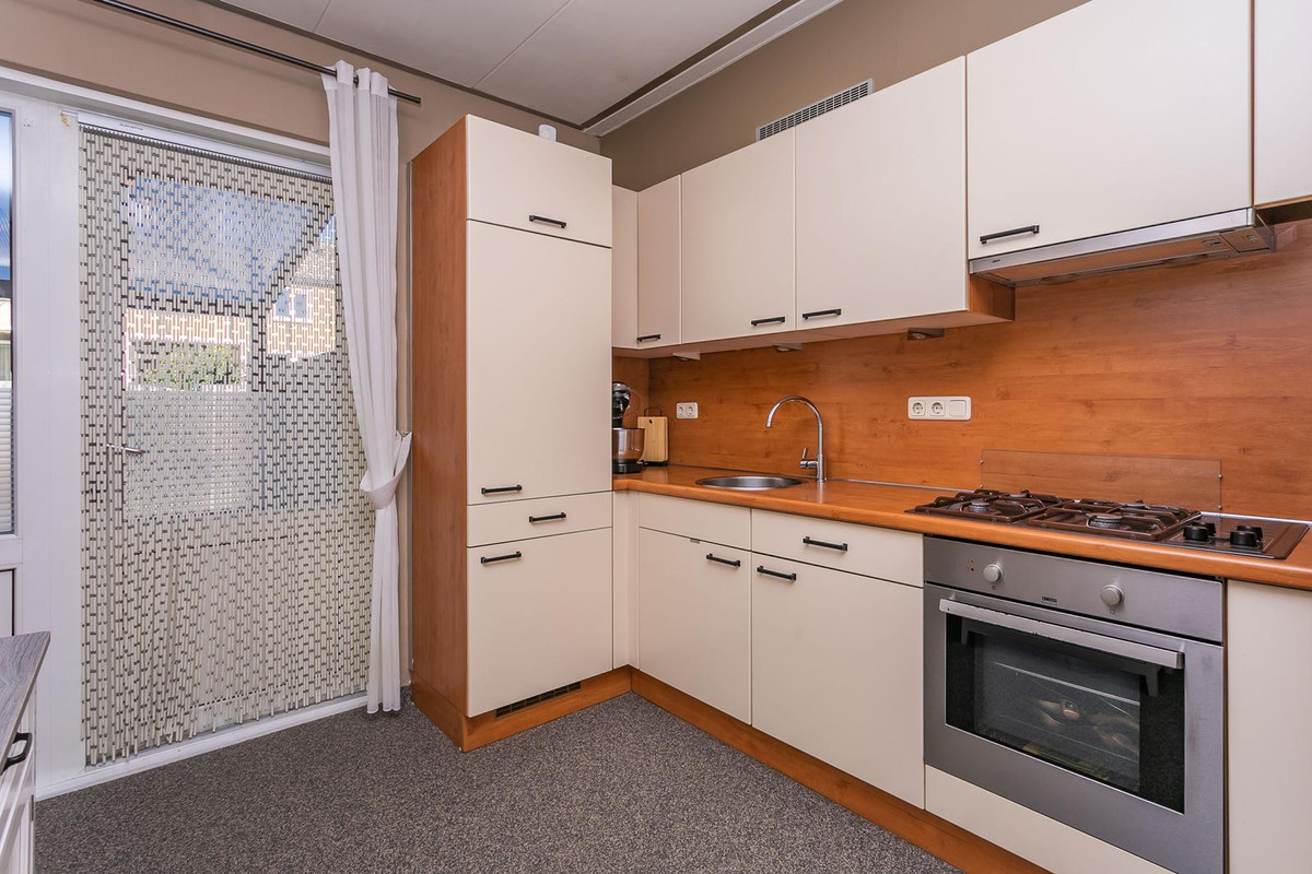 Tussenwoning te koop: Schoutstraat 8, Brunssum