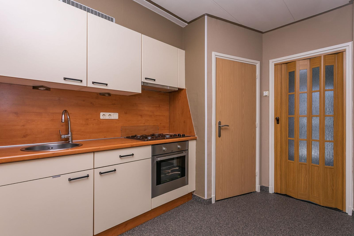 Tussenwoning te koop: Schoutstraat 8, Brunssum