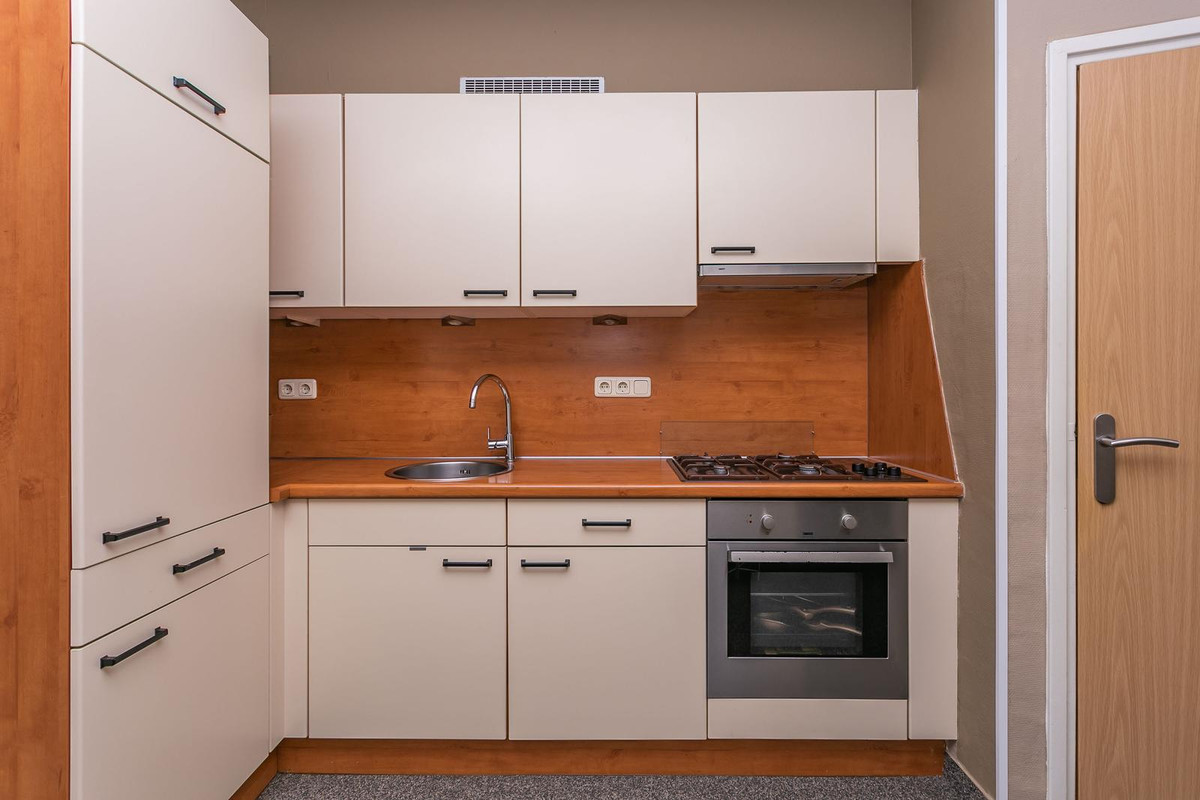 Tussenwoning te koop: Schoutstraat 8, Brunssum