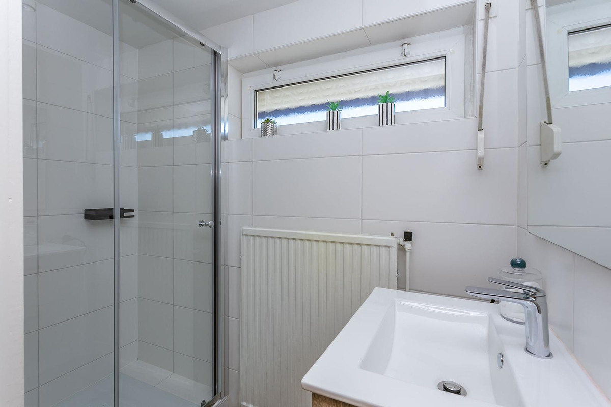 Tussenwoning te koop: Schoutstraat 8, Brunssum