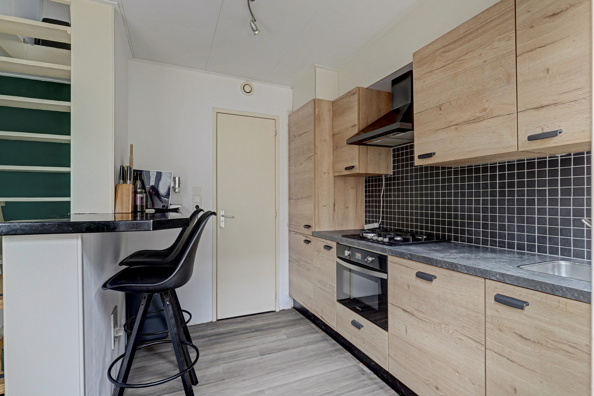 Tussenwoning te koop: Stationsweg 83, Sliedrecht