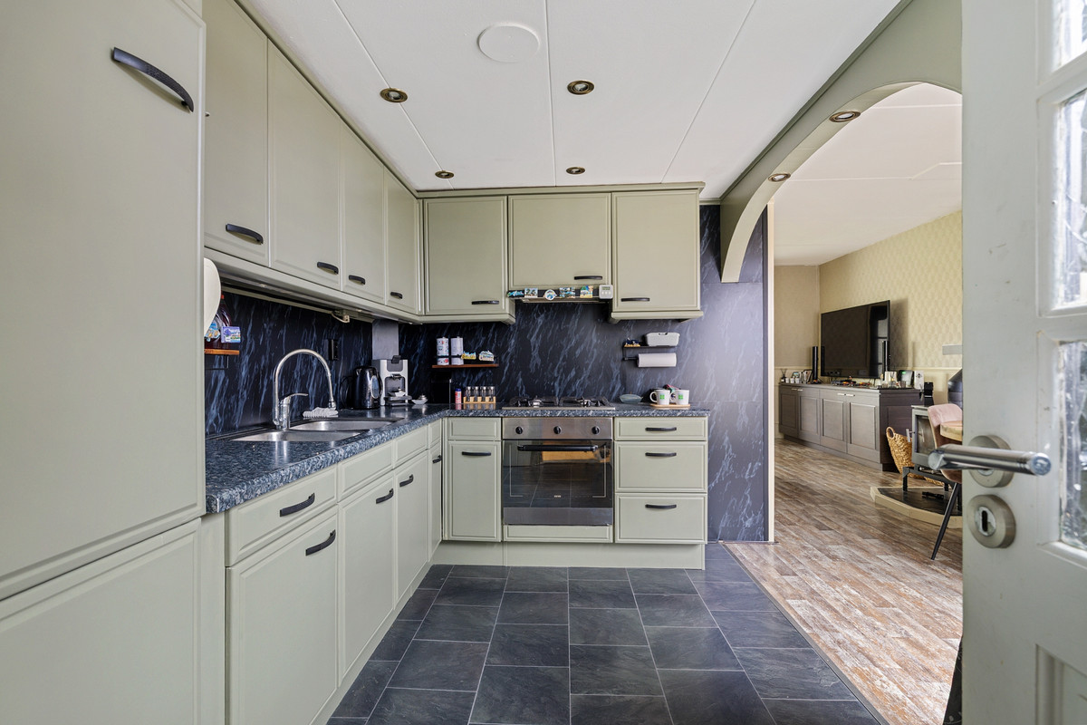 Tussenwoning te koop: De Vang 27, Buitenpost