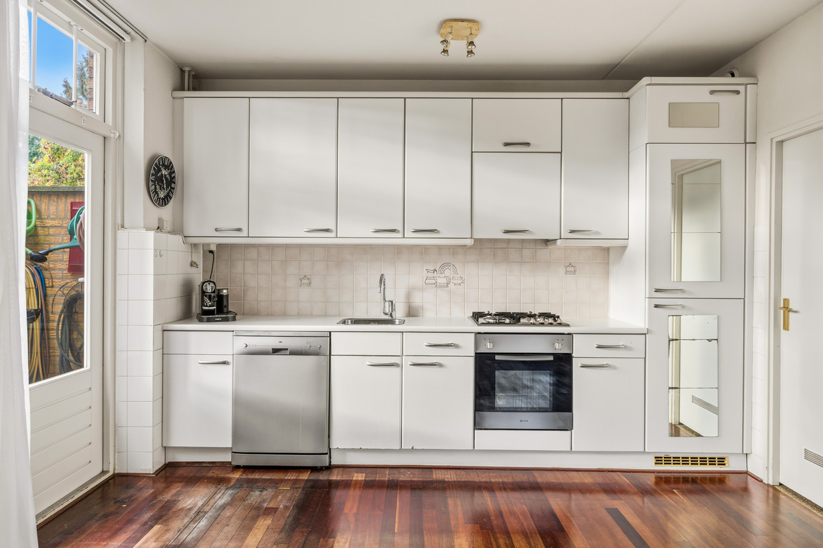 Tussenwoning te koop: Rozentuin 268, Voorburg