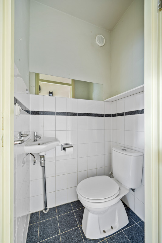 Tussenwoning te koop: Rozentuin 268, Voorburg