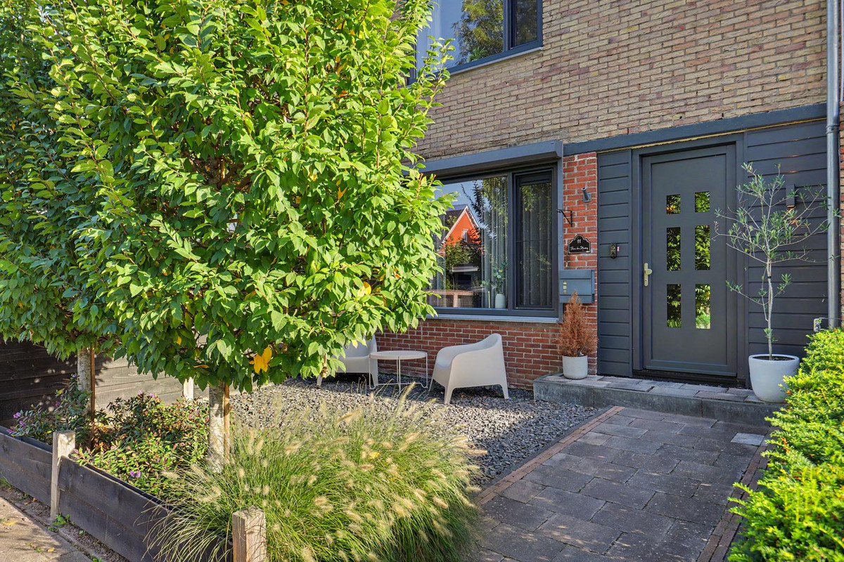 Tussenwoning te koop: Singel 11, Puttershoek