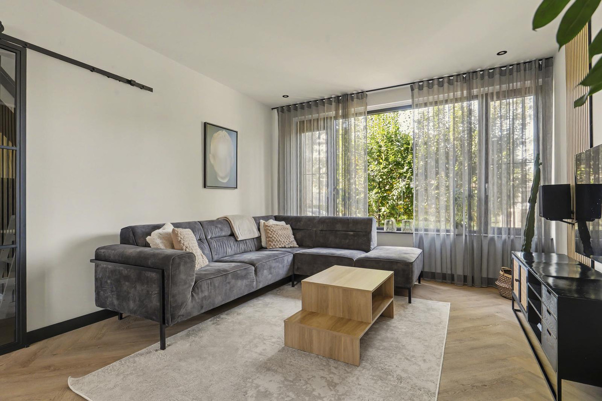 Tussenwoning te koop: Singel 11, Puttershoek