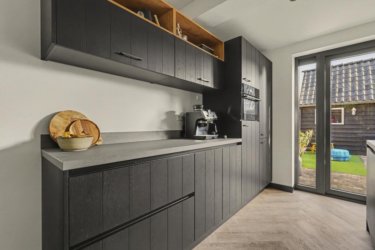 Tussenwoning te koop: Singel 11, Puttershoek