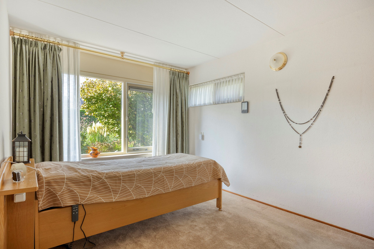 Vrijstaande woning te koop: Nachtegaallaan 6, Dodewaard
