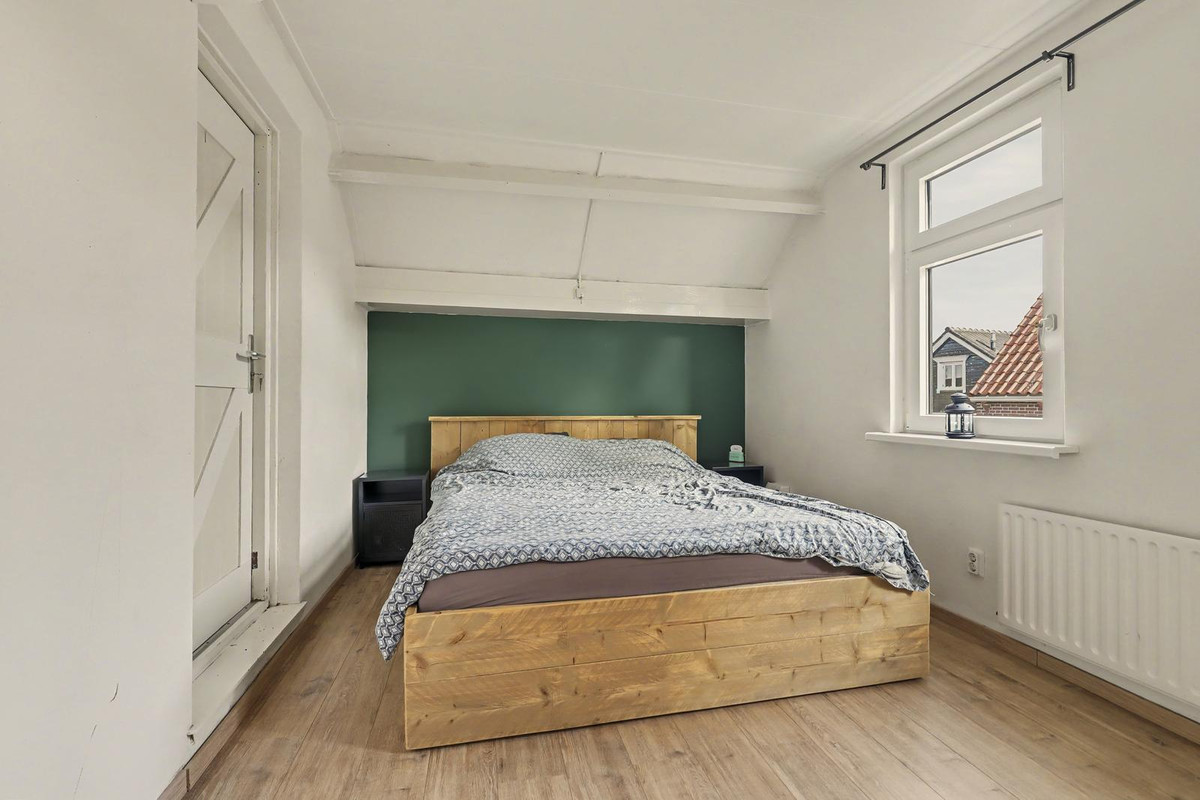 Tussenwoning te koop: Dorpsstraat 6, Sirjansland