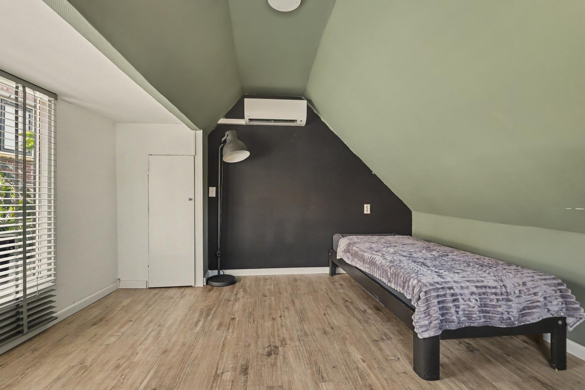 Tussenwoning te koop: Dorpsstraat 6, Sirjansland