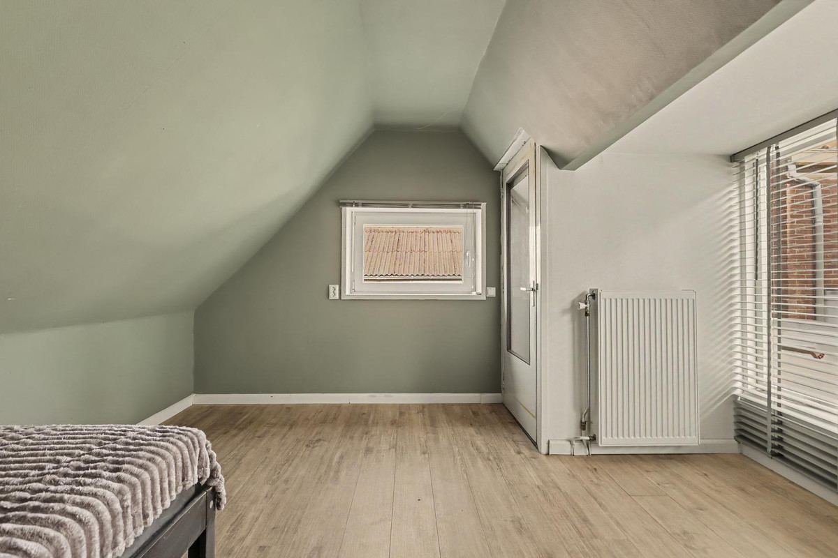 Tussenwoning te koop: Dorpsstraat 6, Sirjansland