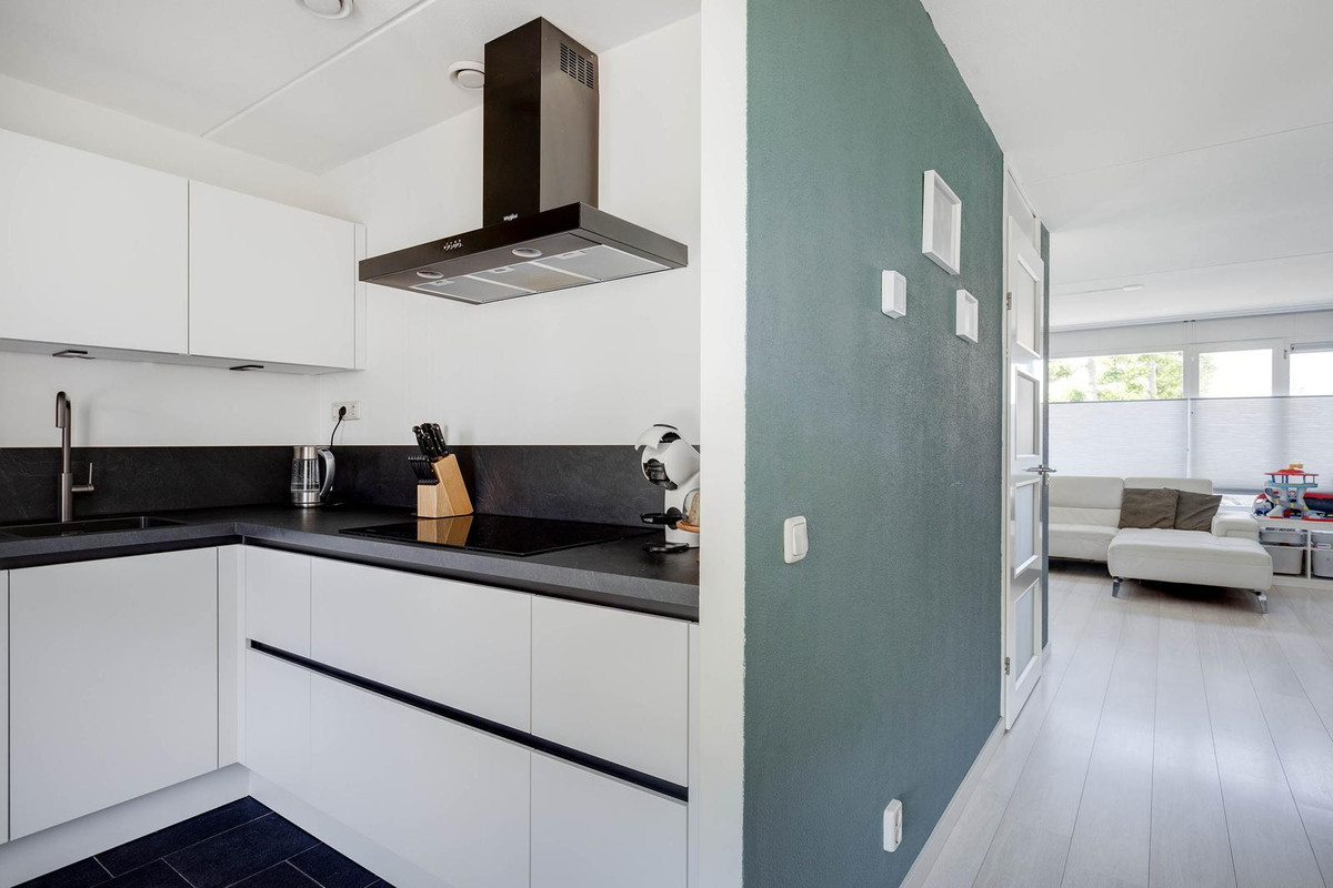 Tussenwoning te koop: Meidoorn 14, Elsloo