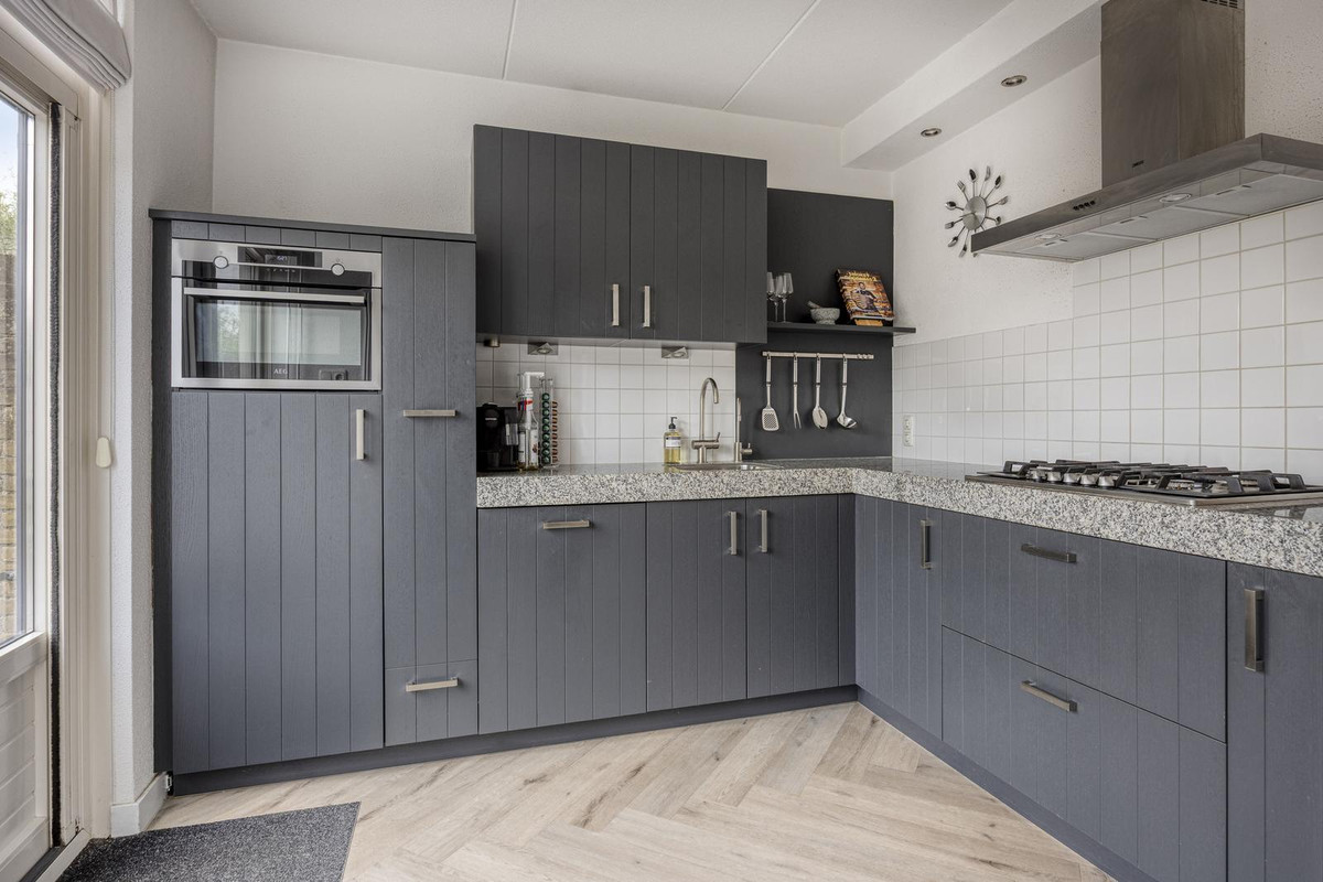 Tussenwoning te koop: Valkenhorst 12, Boskoop