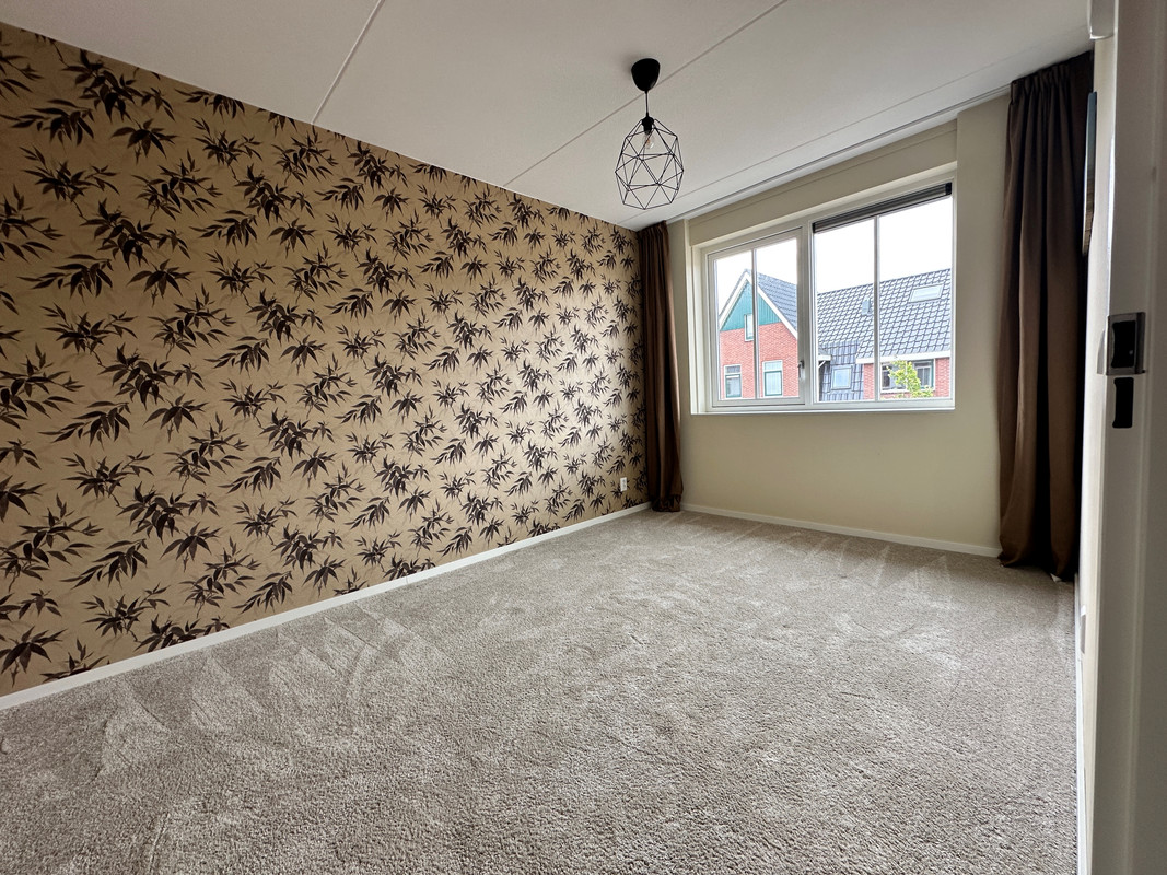 Tussenwoning te huur: Weijland 14, Spierdijk