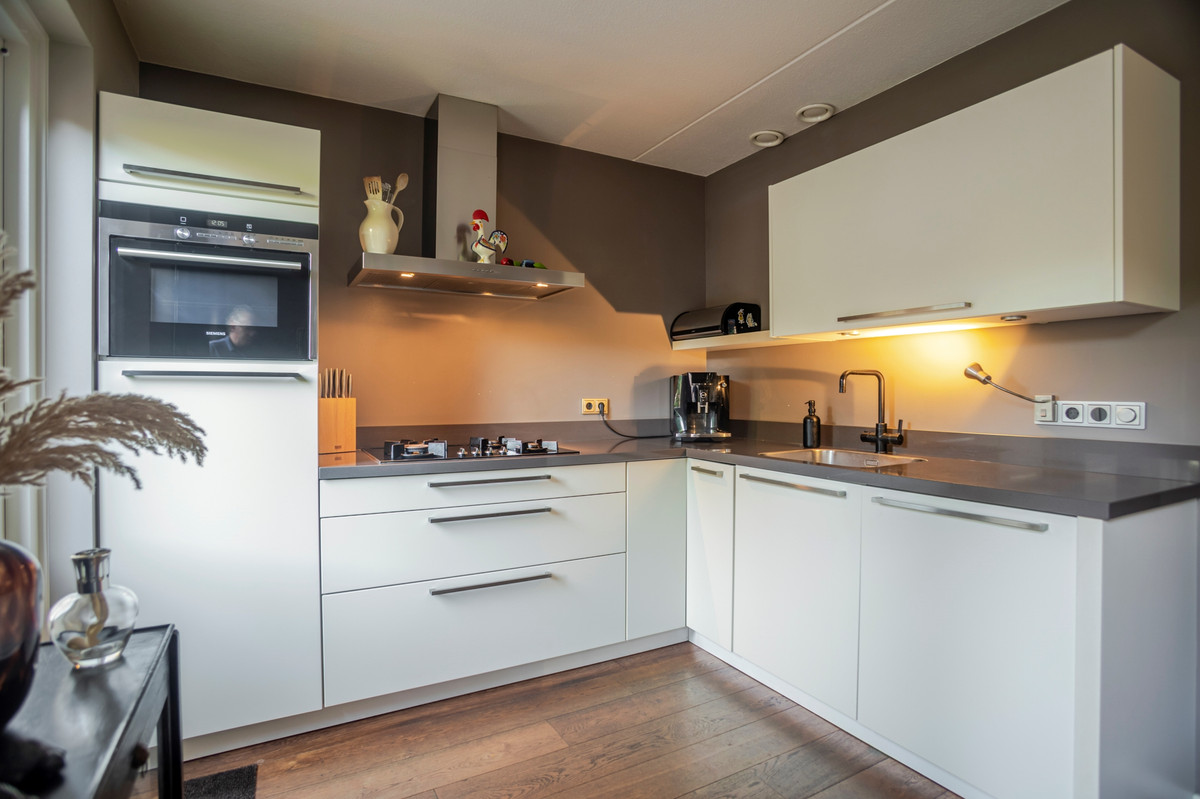 Tussenwoning te koop: Alm 10, Kaatsheuvel